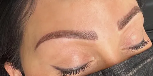 The appearance of a woman's eyebrows after the Combo Brows technique.