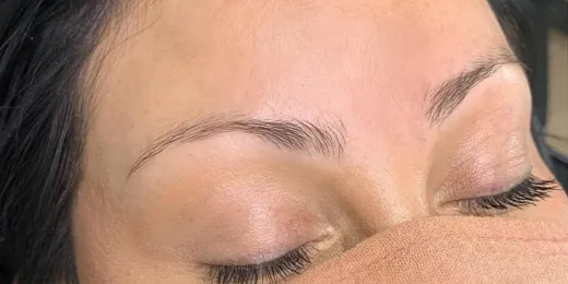 The appearance of a woman's eyebrows before the Combo Brows technique.