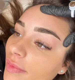 A client's face after a microblading session.